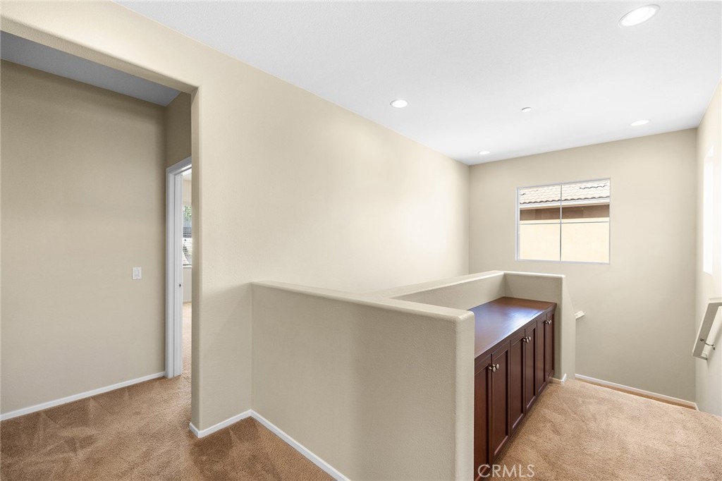 12047 Dewar Drive Riverside, CA 92505 - Photo 18 of 40 a hallway with windows