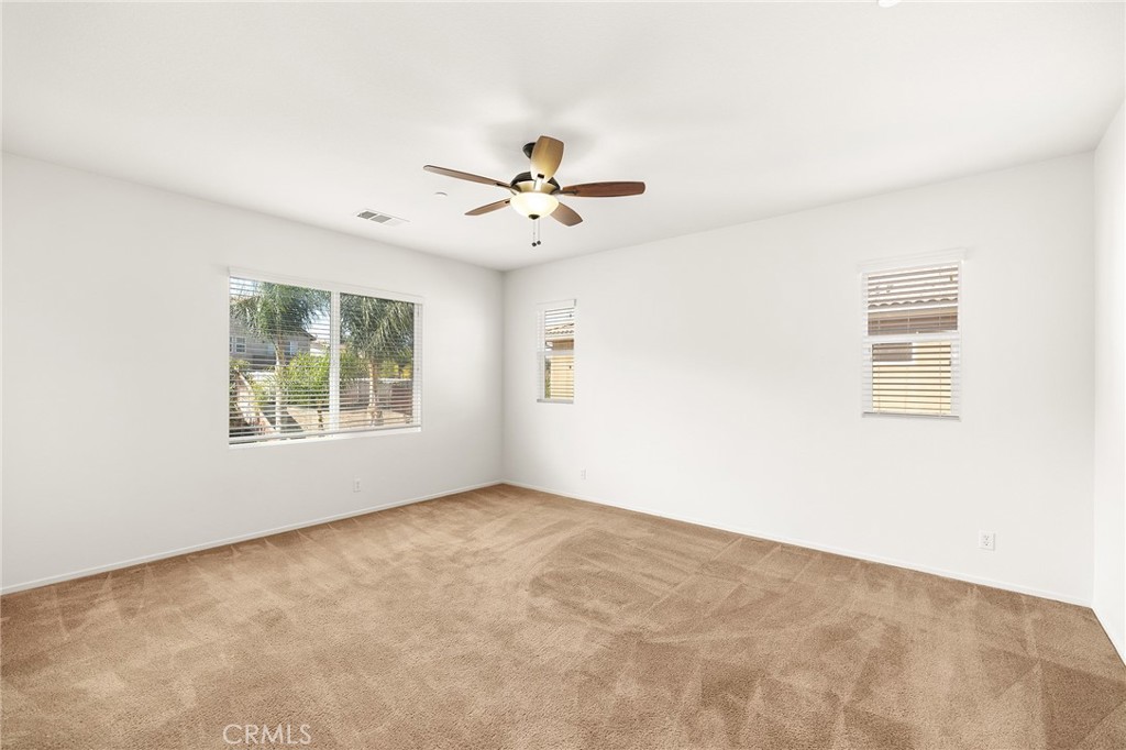 12047 Dewar Drive Riverside, CA 92505 - Photo 19 of 40 a view of an empty room with a window