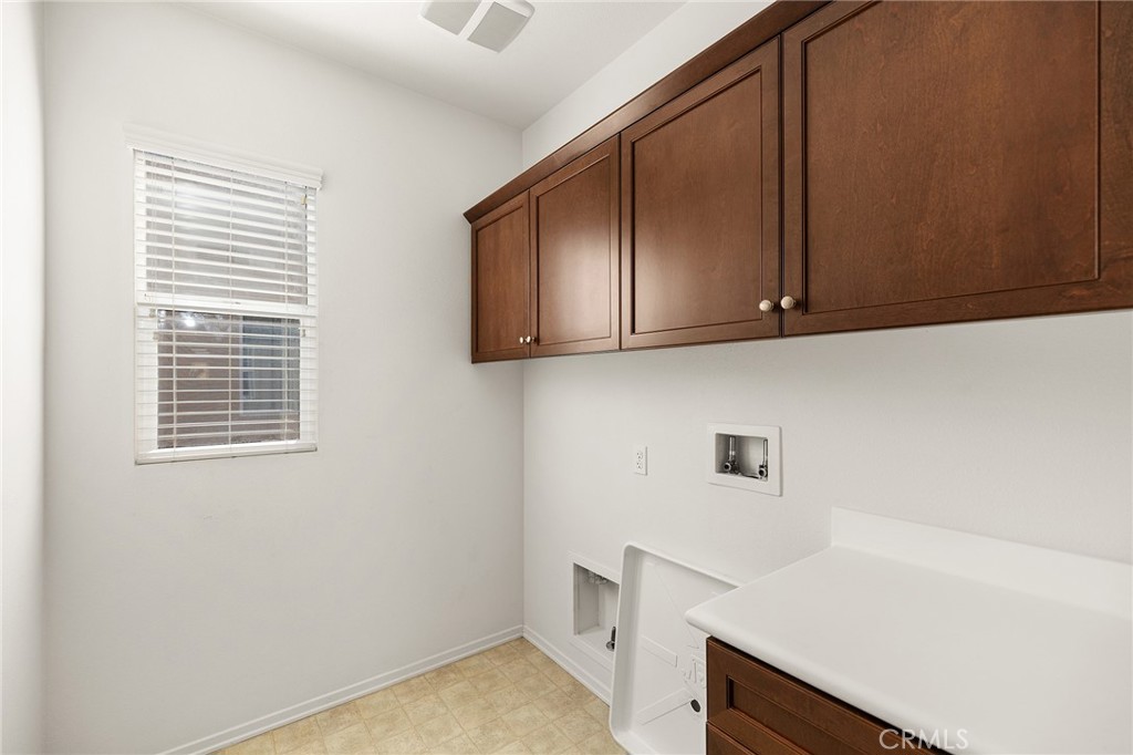 12047 Dewar Drive Riverside, CA 92505 - Photo 29 of 40 a utility room with dryer and washer
