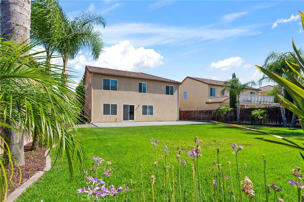 12047 Dewar Drive Riverside, CA 92505 - Photo 35 of 40 a front view of house with yard and green space