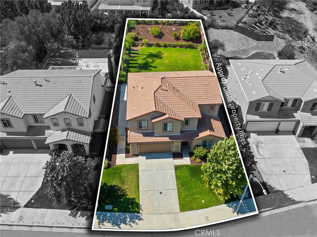 12047 Dewar Drive Riverside, CA 92505 - Photo 38 of 40 an aerial view of a house with a yard and potted plants