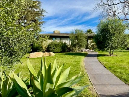 a kitchen with sink cabinets and appliances