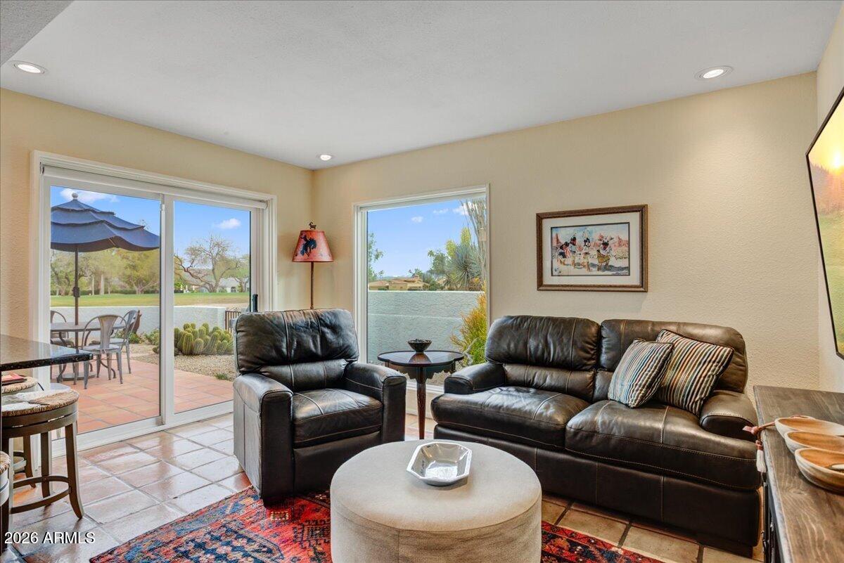 18810 East Chinle Drive Rio Verde, AZ 85263 - Photo 14 of 38 a living room with furniture and a large window