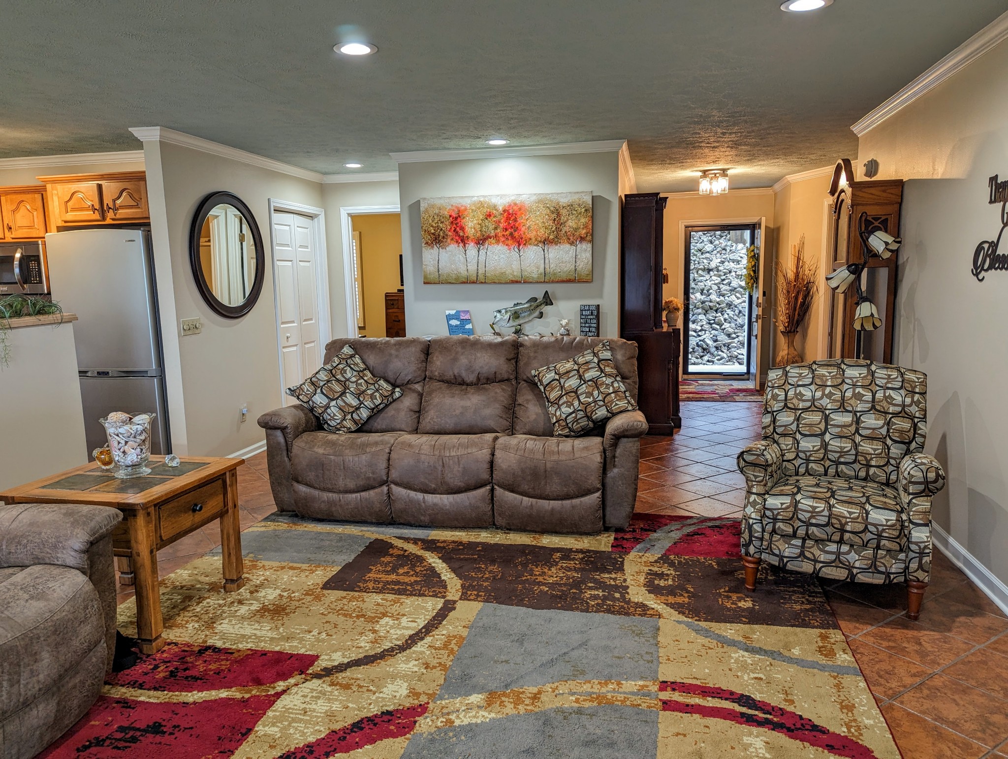 226 Pleasant Place, Unit B2 Springville, TN 38256 - Photo 11 of 43 a living room with furniture and a large window
