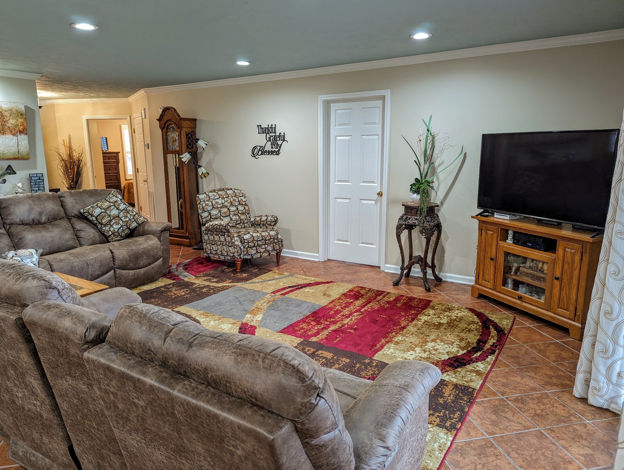 226 Pleasant Place, Unit B2 Springville, TN 38256 - Photo 12 of 43 a living room with furniture and a flat screen tv