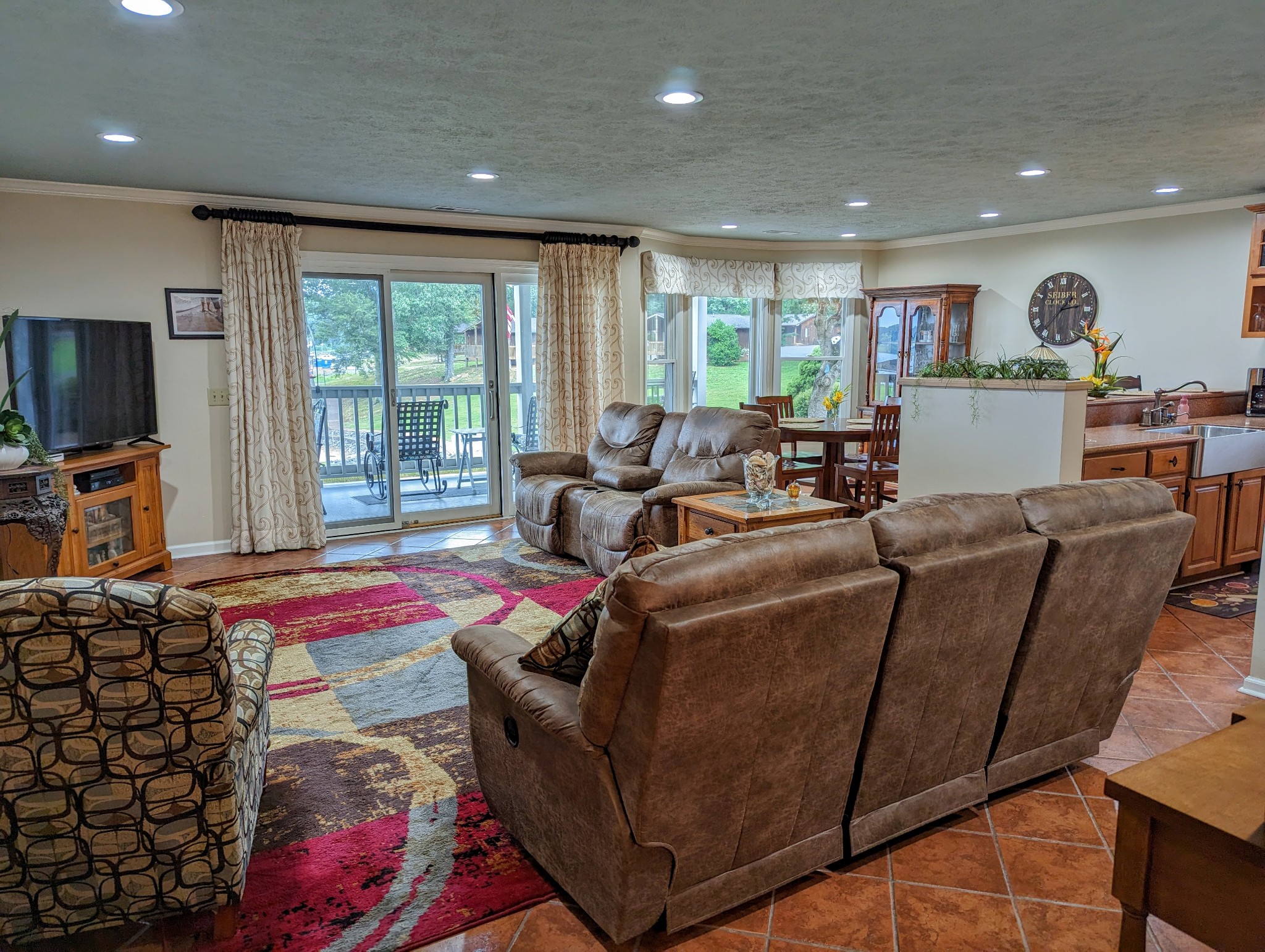 226 Pleasant Place, Unit B2 Springville, TN 38256 - Photo 22 of 43 a living room with furniture and a flat screen tv