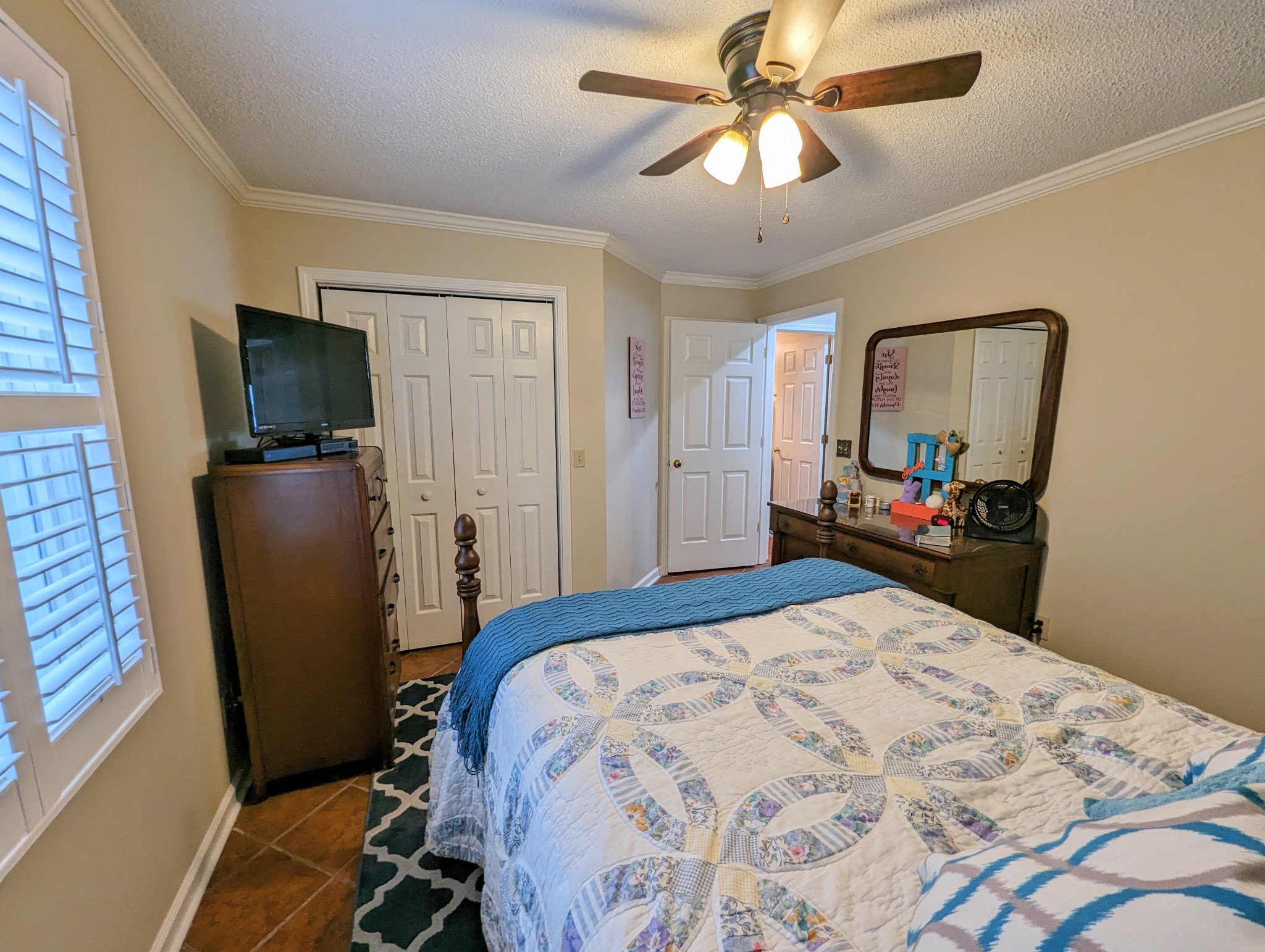 226 Pleasant Place, Unit B2 Springville, TN 38256 - Photo 25 of 43 a bedroom with a bed and a flat screen tv