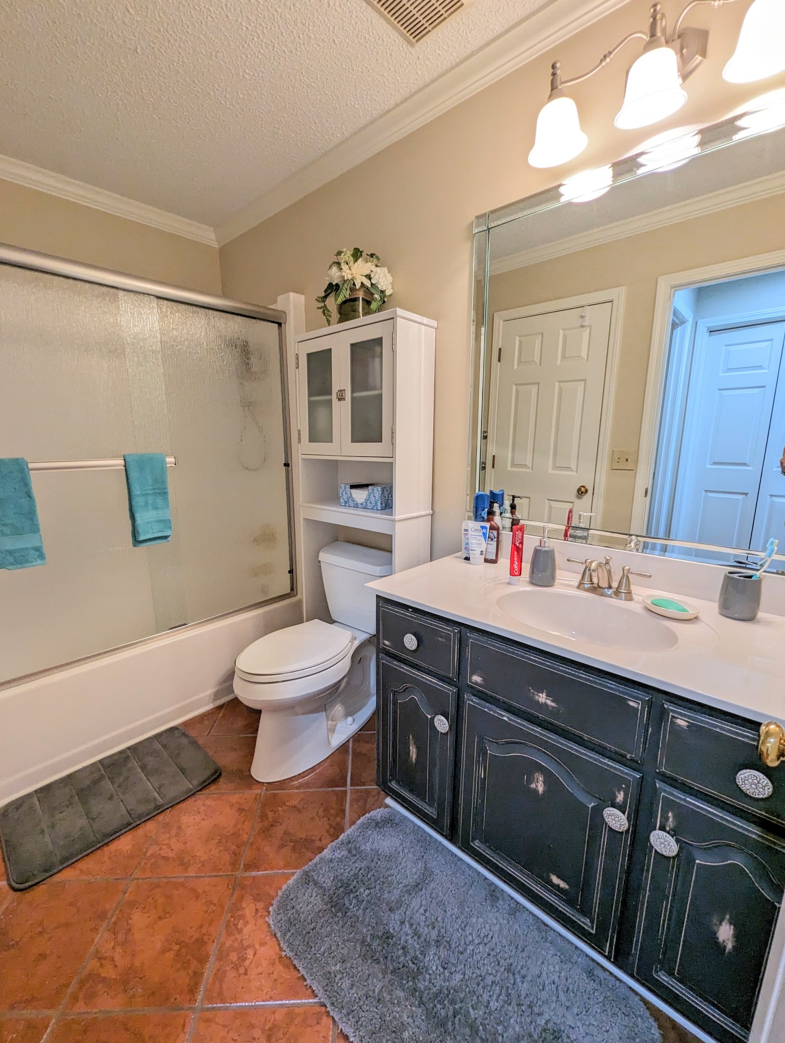 226 Pleasant Place, Unit B2 Springville, TN 38256 - Photo 26 of 43 a spacious bathroom with a double vanity sink toilet and a mirror