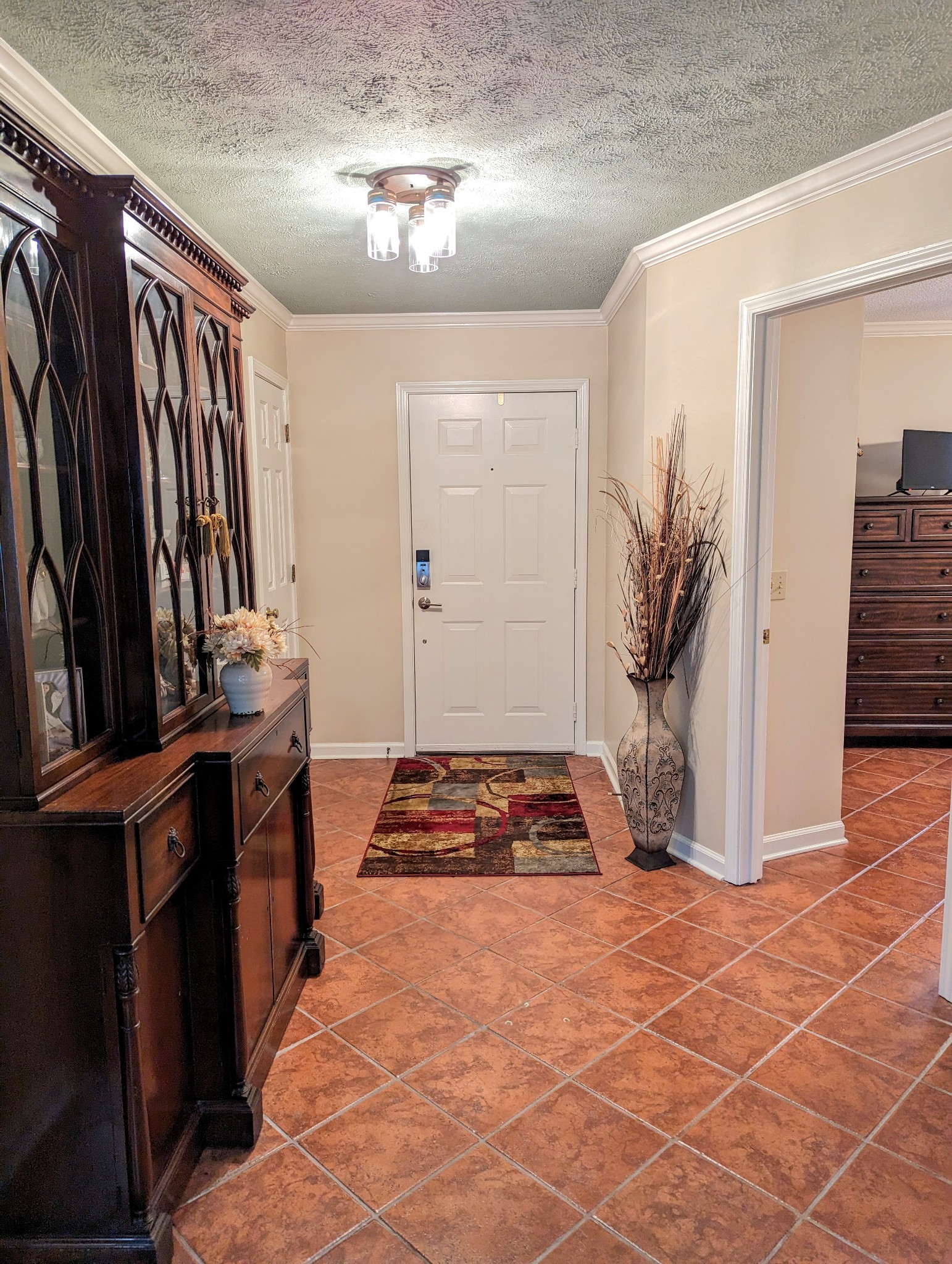 226 Pleasant Place, Unit B2 Springville, TN 38256 - Photo 28 of 43 a walk in closet with wooden floor