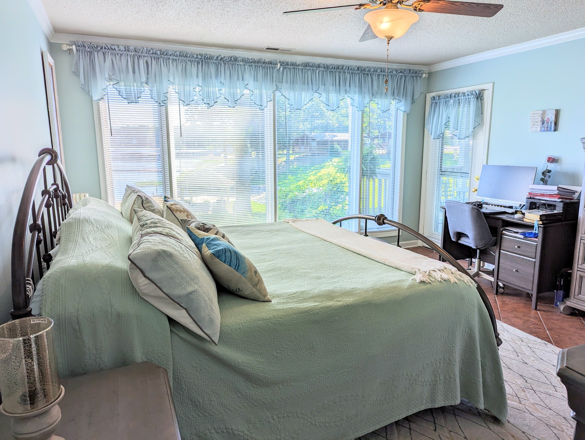 226 Pleasant Place, Unit B2 Springville, TN 38256 - Photo 3 of 43 a bedroom with a bed and large windows