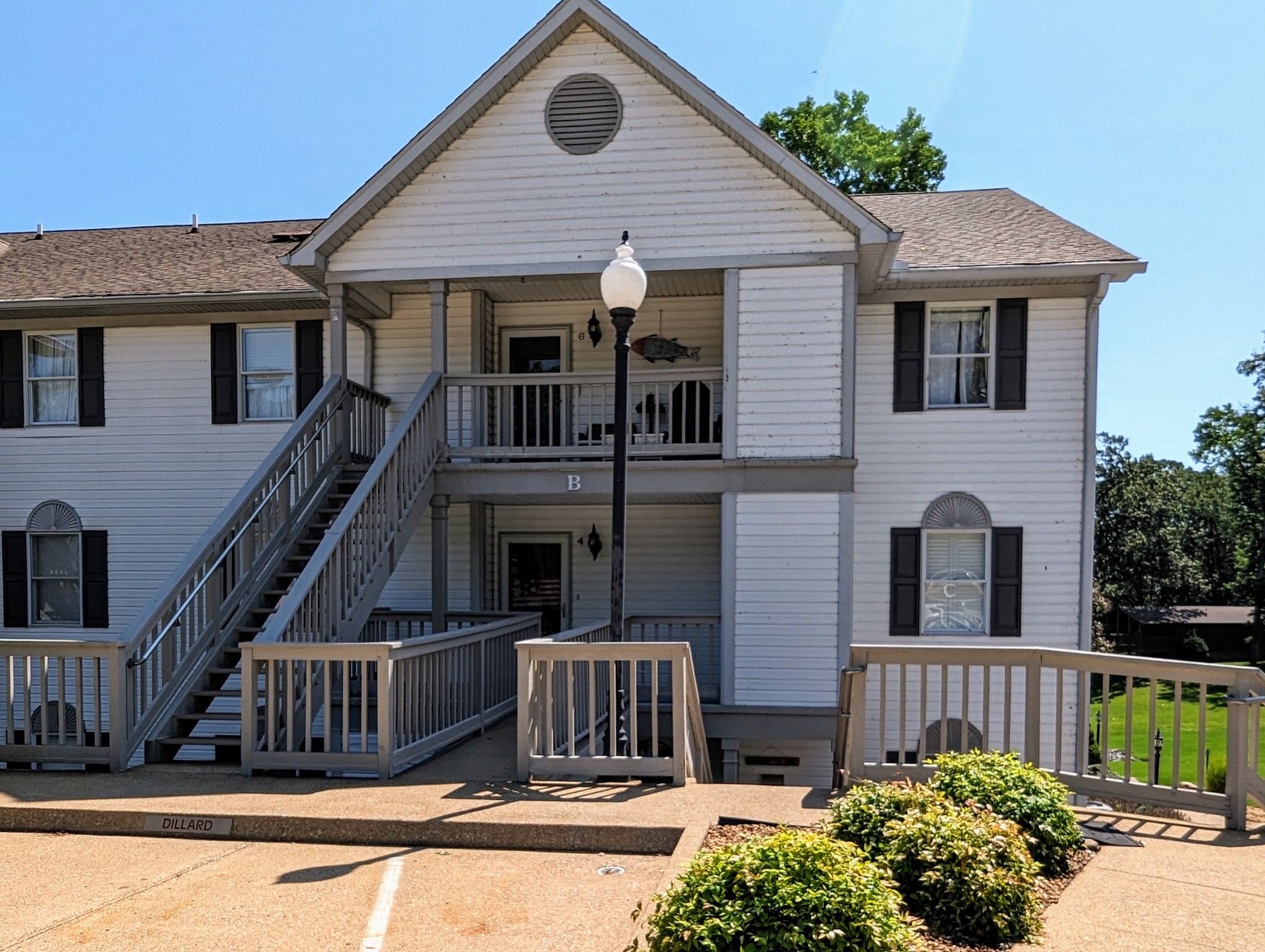 226 Pleasant Place, Unit B2 Springville, TN 38256 - Photo 42 of 43 a front view of a house with a garden