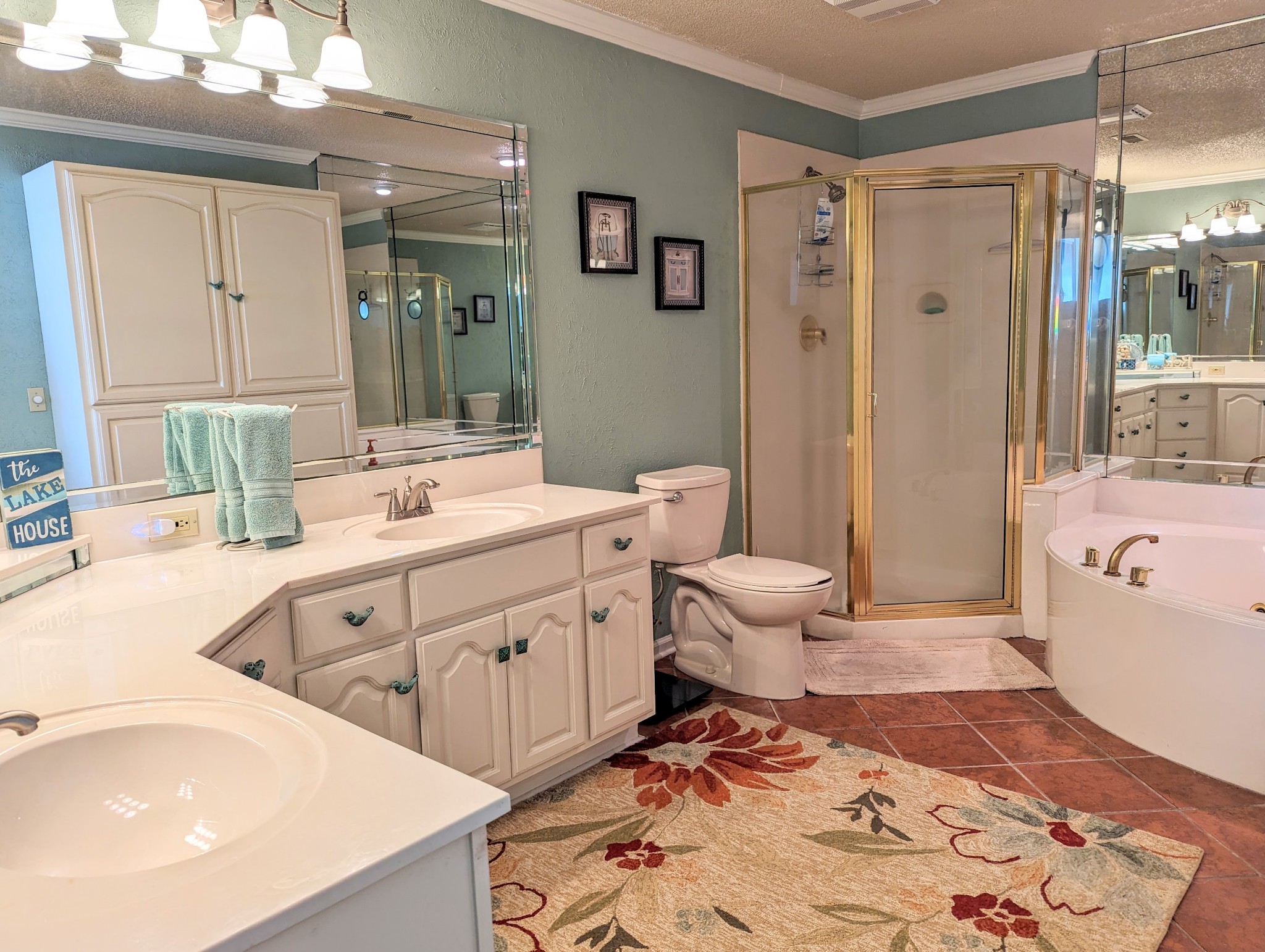 226 Pleasant Place, Unit B2 Springville, TN 38256 - Photo 5 of 43 a bathroom with a double vanity sink mirror and toilet