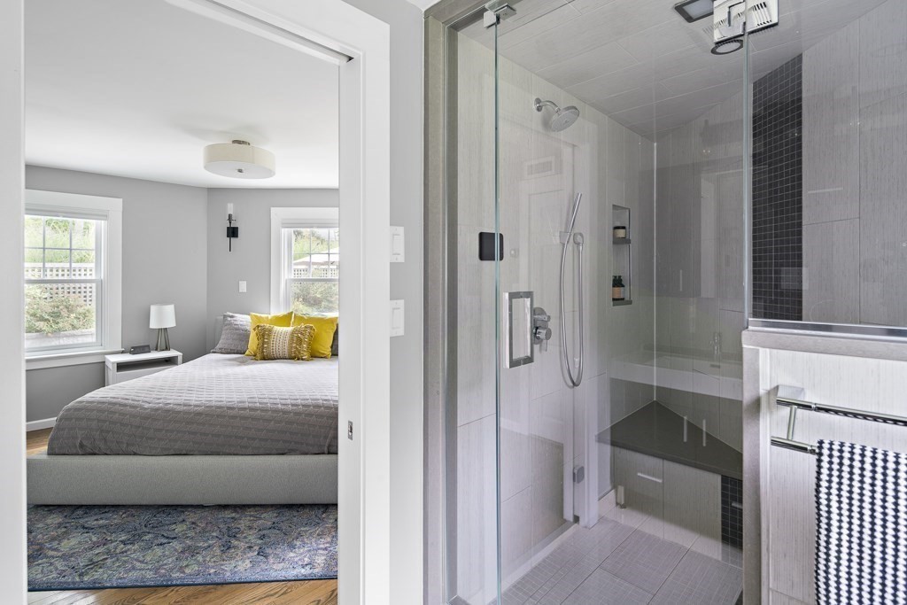 60 Rice Road Wayland, MA 01778 - Photo 12 of 26 a bedroom with a bed and a couch