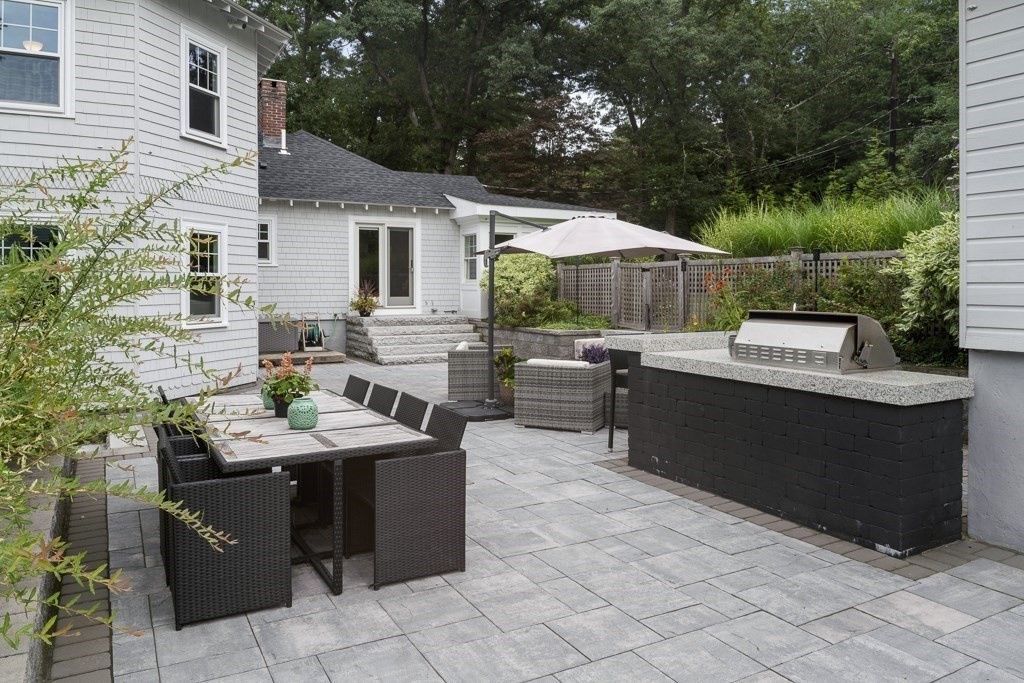 60 Rice Road Wayland, MA 01778 - Photo 19 of 26 a view of a patio with open kitchen