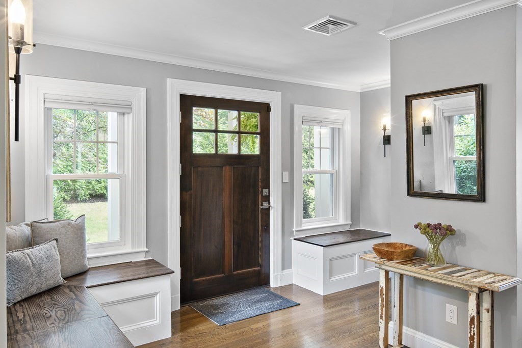 60 Rice Road Wayland, MA 01778 - Photo 2 of 26 a living room with furniture and a window