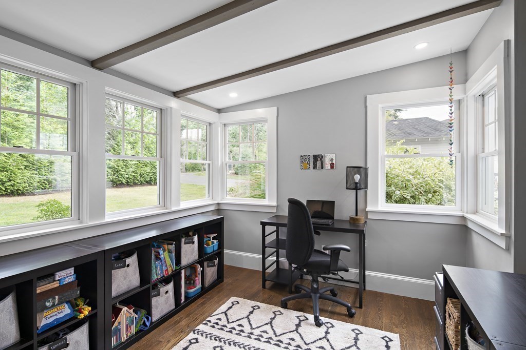60 Rice Road Wayland, MA 01778 - Photo 8 of 26 a view of a workspace with furniture and a window