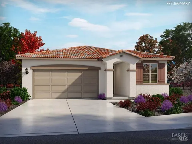 a front view of a house with a garage