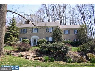1 Rabbit Run Road Malvern, PA 19355 - Photo 1 of 10 a front view of house with yard and green space