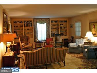 1 Rabbit Run Road Malvern, PA 19355 - Photo 6 of 10 a living room with furniture a lamp and large window