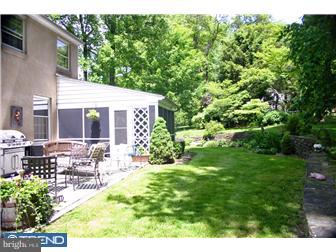 1 Rabbit Run Road Malvern, PA 19355 - Photo 8 of 10 a view of house with backyard outdoor seating and green space