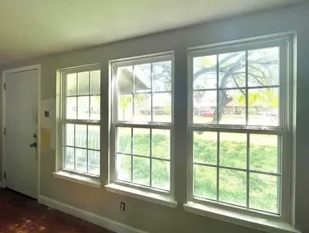 a view of an empty room with a window