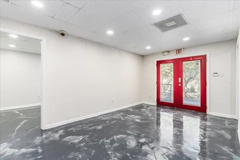 a bathroom with a sink toilet vanity and shower