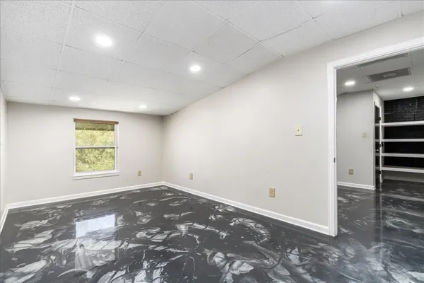 a kitchen with stainless steel appliances granite countertop a sink and stove top oven