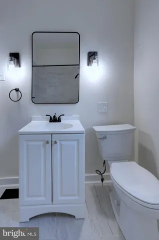 a bathroom with a bath tub with a shower