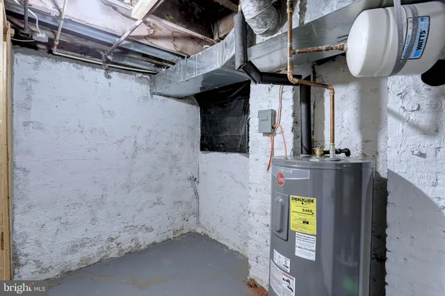 a view of room with wooden floor