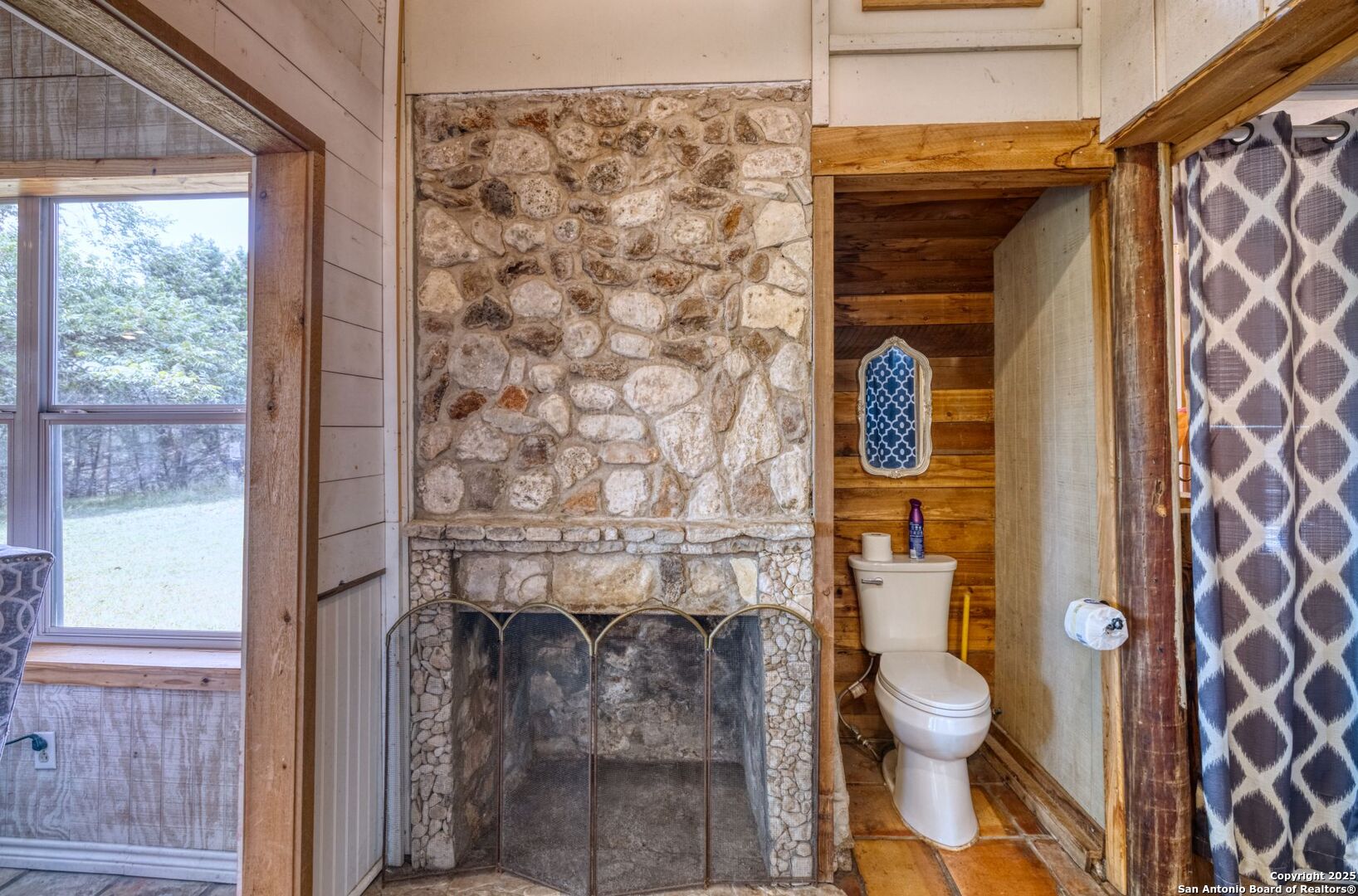 394 Squirrel Bend Uvalde, TX 78801 - Photo 23 of 80 a bathroom with a toilet and a shower