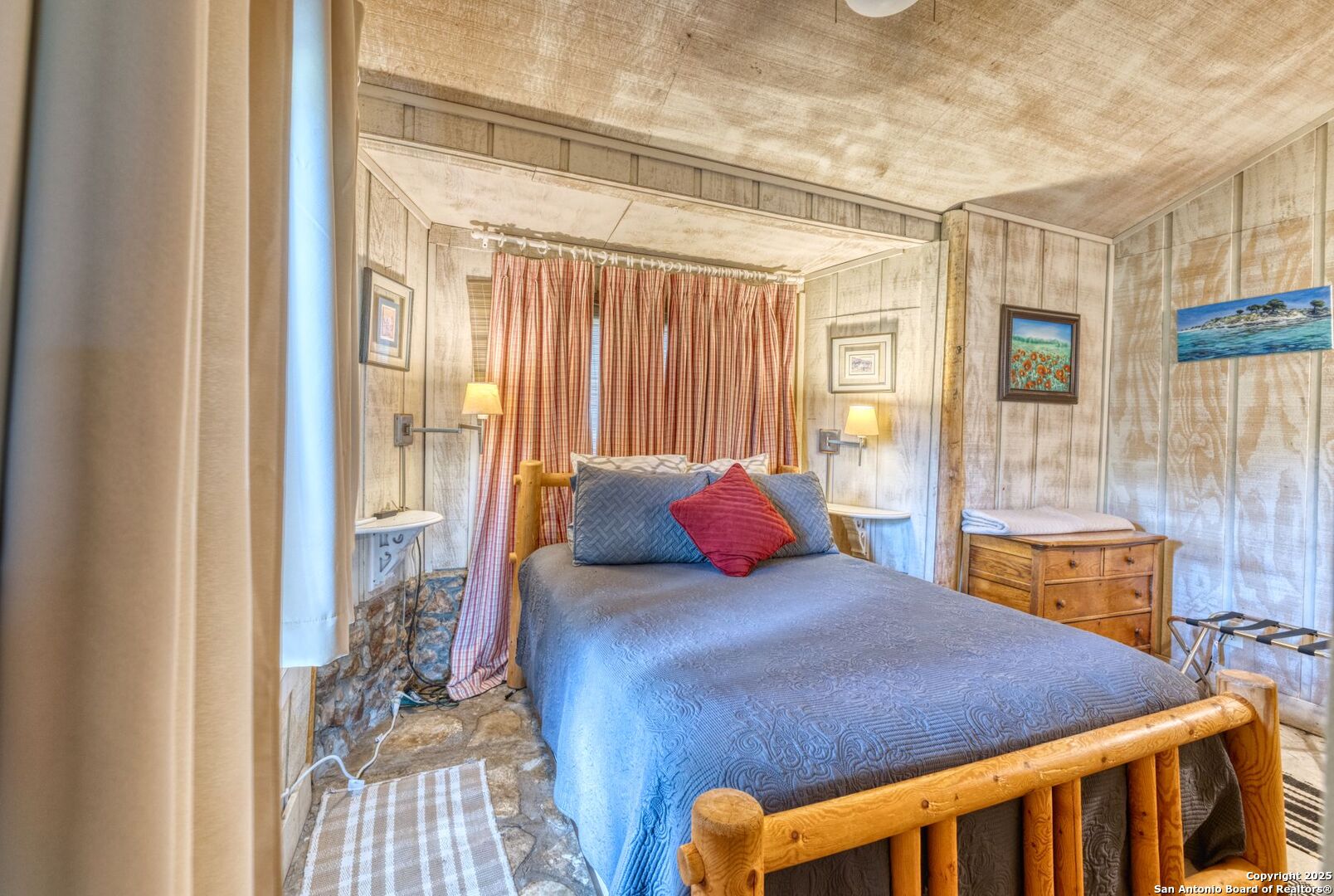 394 Squirrel Bend Uvalde, TX 78801 - Photo 26 of 80 a bedroom with a bed and a table