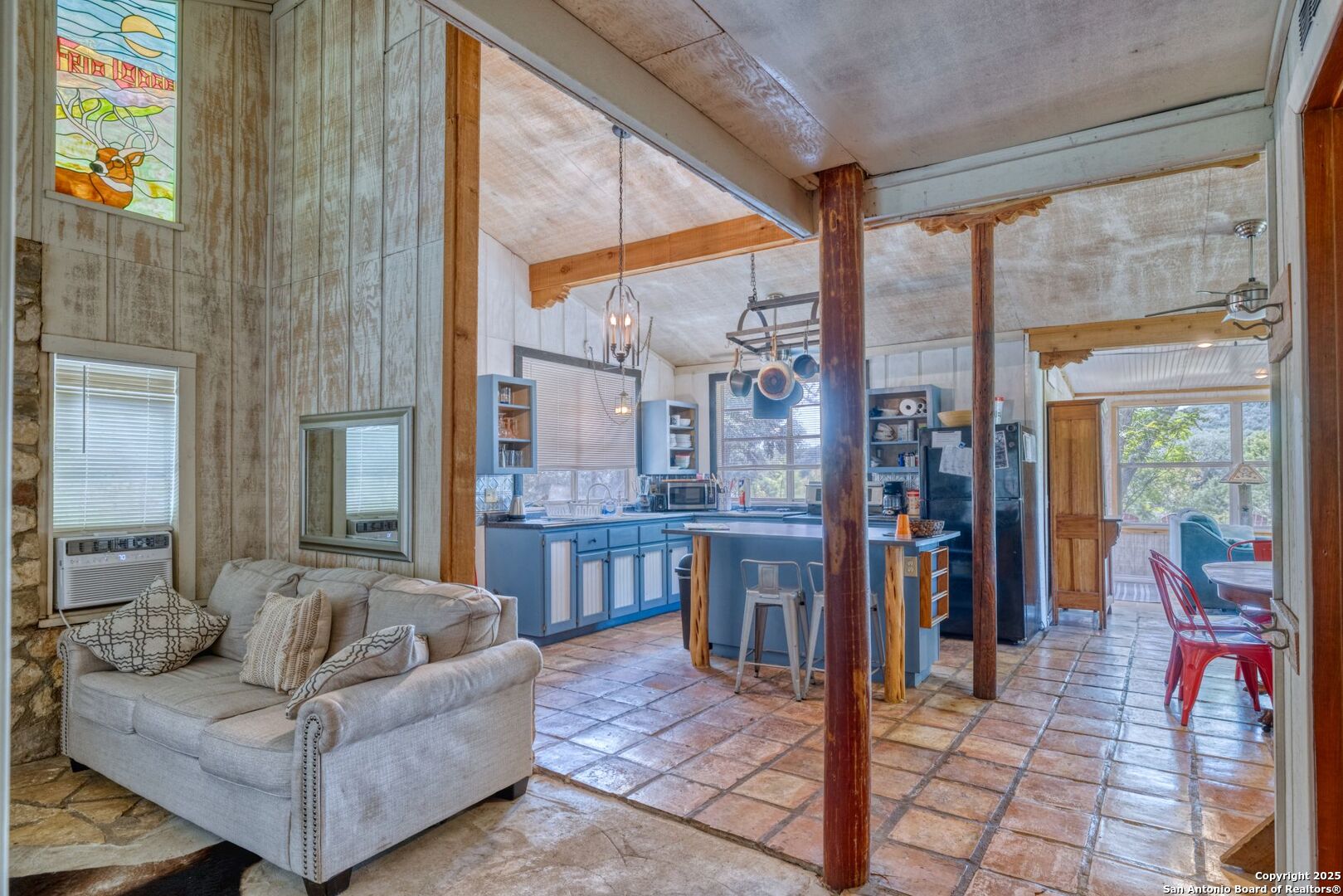 394 Squirrel Bend Uvalde, TX 78801 - Photo 29 of 80 a living room with furniture and large windows
