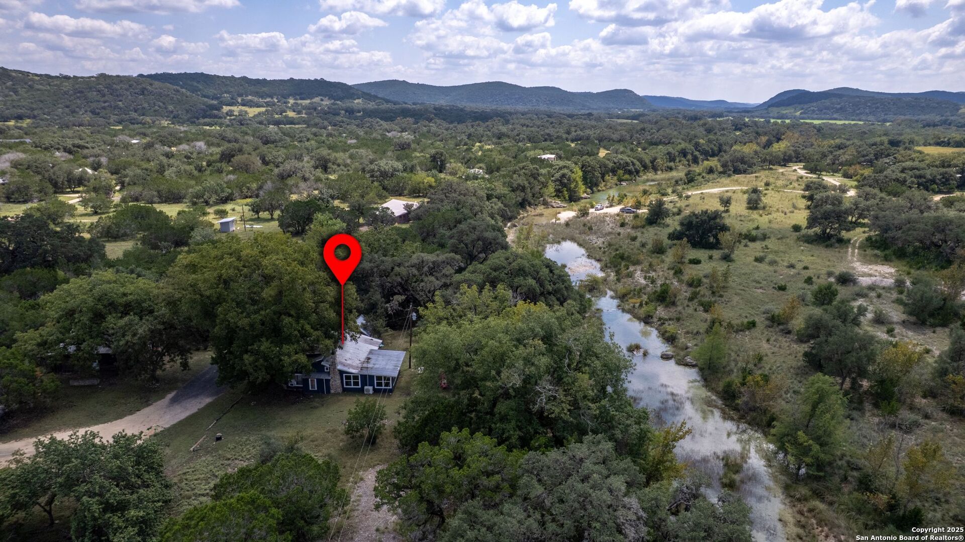 394 Squirrel Bend Uvalde, TX 78801 - Photo 50 of 80 a view of a town with mountains in the background