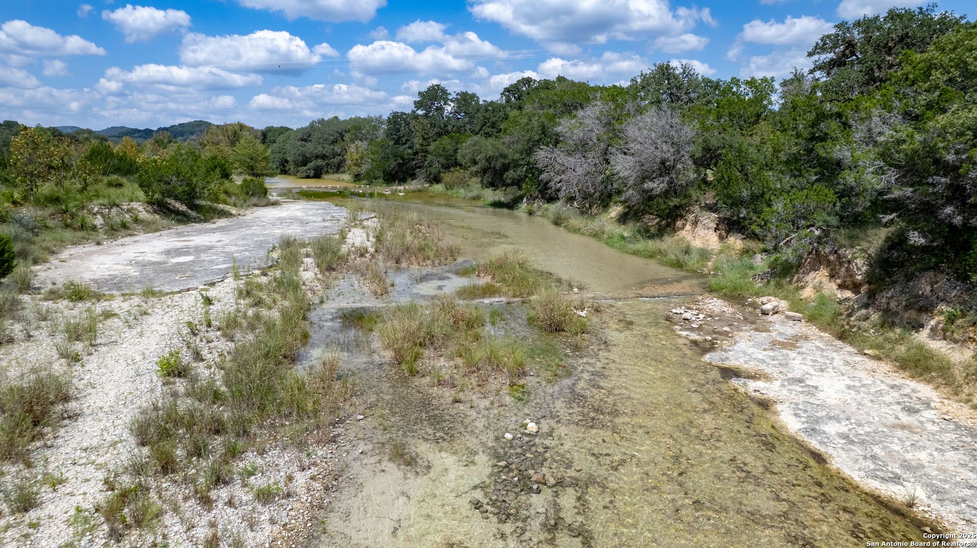 394 Squirrel Bend Uvalde, TX 78801 - Photo 61 of 80 a view of a yard with a tree