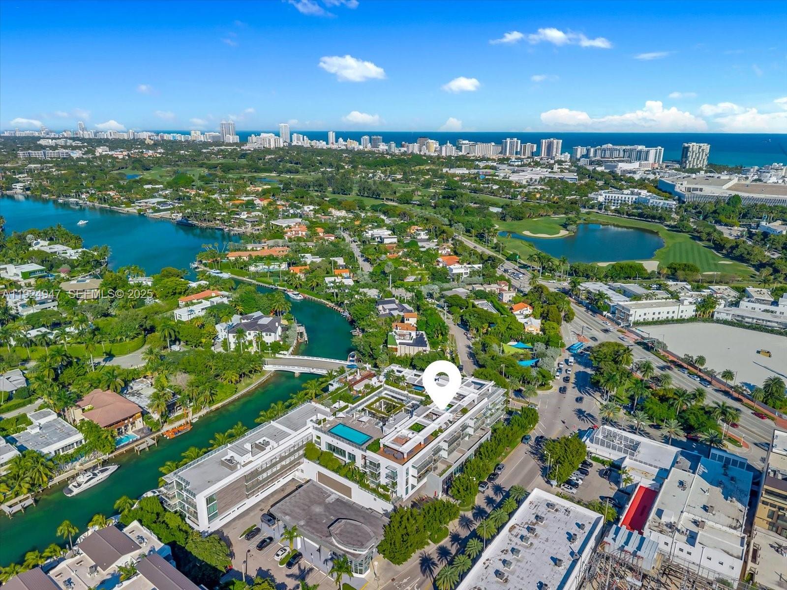 1201 20th Street, Unit PH07 Miami Beach, FL 33139 - Photo 30 of 30 an aerial view of a city with lots of residential buildings ocean and mountain view in back
