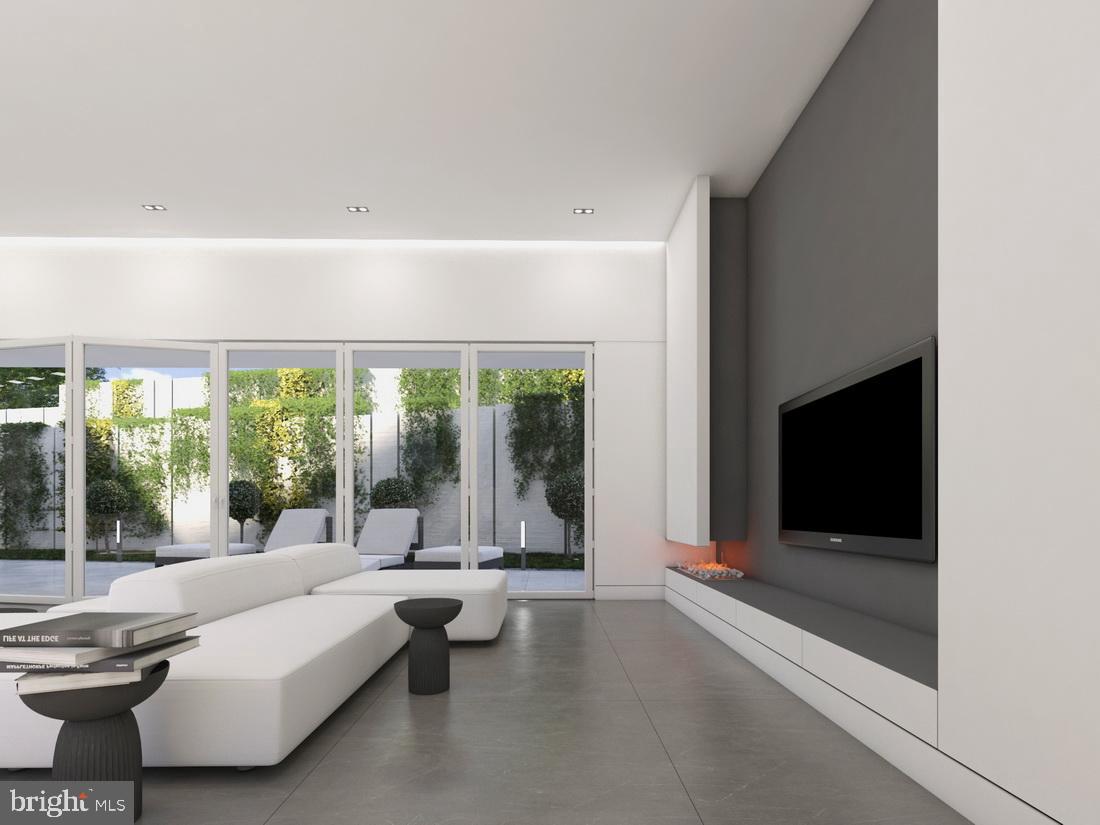 1311 Ranleigh Road McLean, VA 22101 - Photo 14 of 17 a living room with furniture tv and a large window