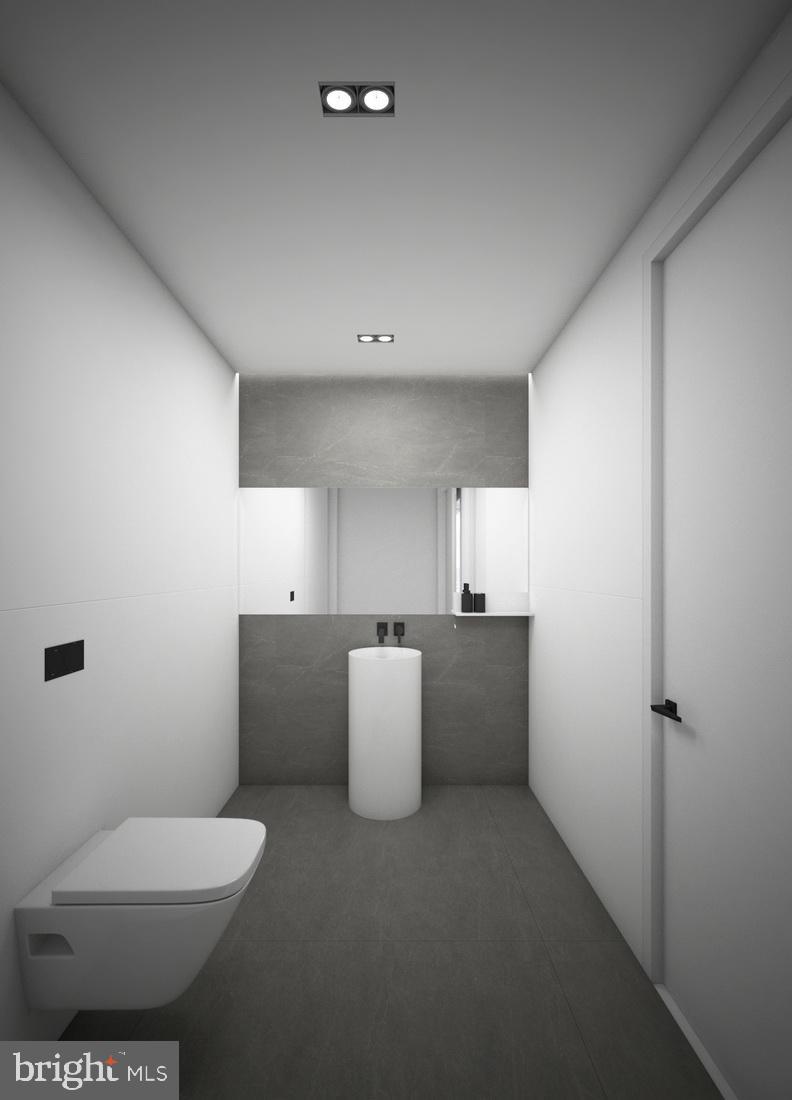 1311 Ranleigh Road McLean, VA 22101 - Photo 15 of 17 a bathroom with a toilet and a sink