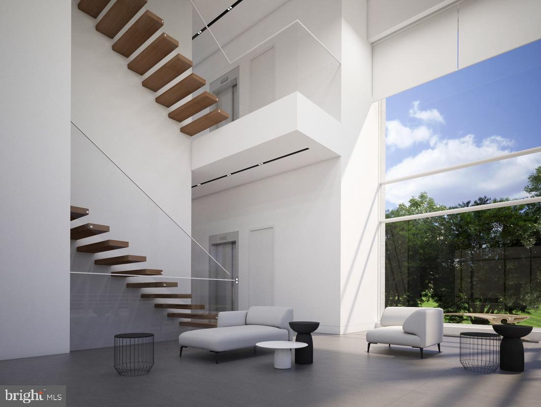 1311 Ranleigh Road McLean, VA 22101 - Photo 5 of 17 a view of hall way with furniture and stairs