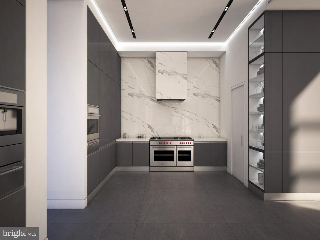 1311 Ranleigh Road McLean, VA 22101 - Photo 8 of 17 a kitchen with stainless steel appliances a refrigerator and a stove top oven