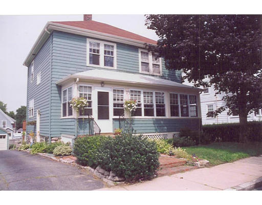 26 Sumner Road Salem, MA 01970 - Photo 1 of 1 a front view of a house with a garden