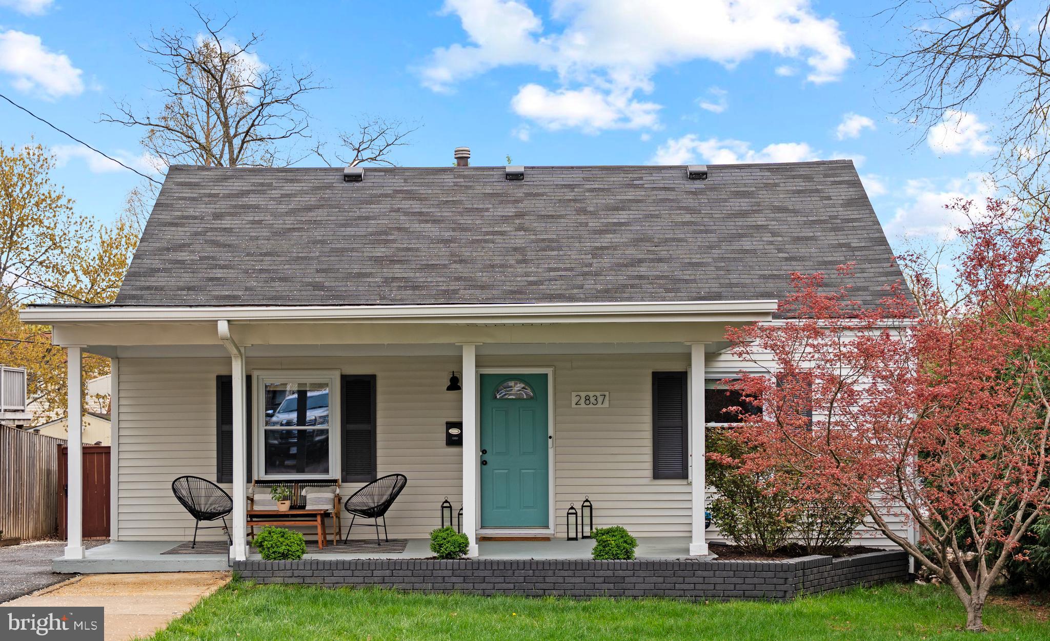 front view of a house with yard