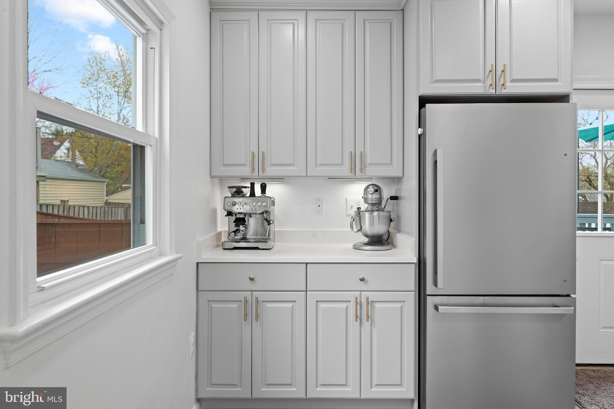 2837 Cameron Road Falls Church, VA 22042 - Photo 11 of 42 a white refrigerator freezer sitting inside of a kitchen
