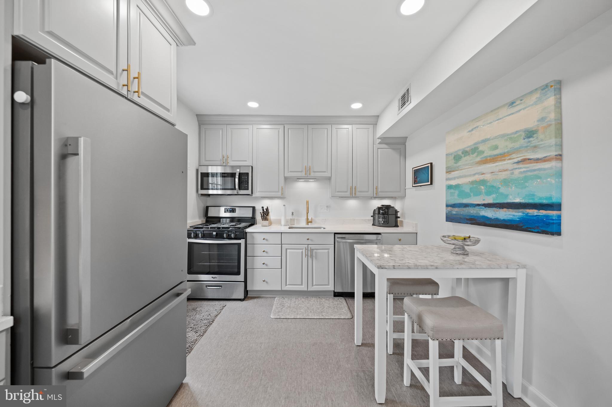 2837 Cameron Road Falls Church, VA 22042 - Photo 12 of 42 a kitchen with a sink cabinets and window