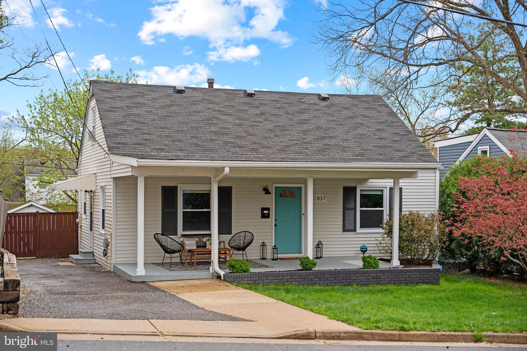 2837 Cameron Road Falls Church, VA 22042 - Photo 2 of 42 a front view of a house with garden and porch