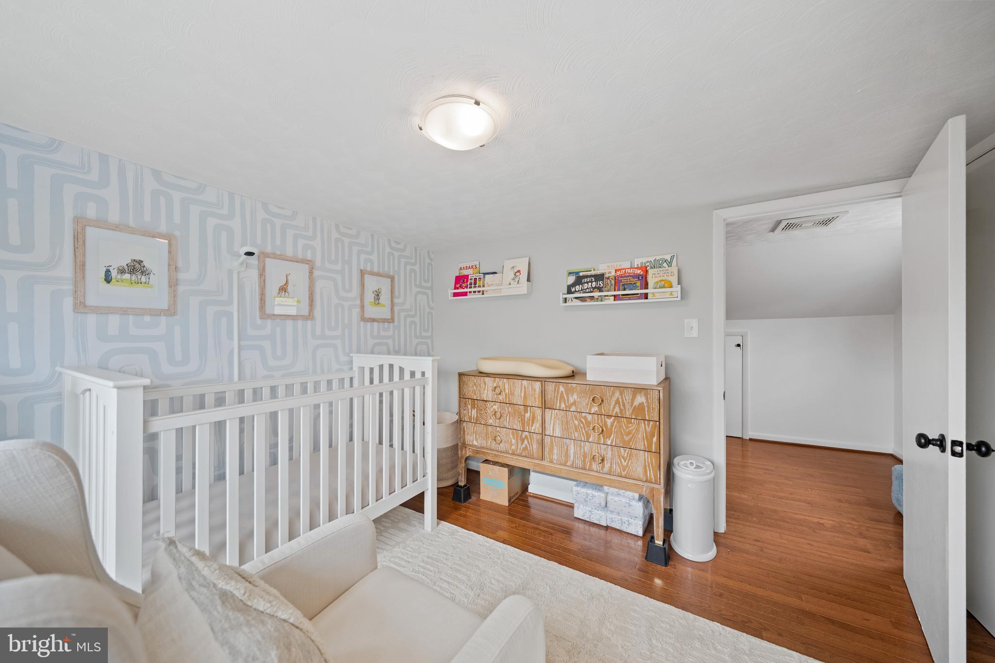 2837 Cameron Road Falls Church, VA 22042 - Photo 22 of 42 a bedroom with furniture and a wooden floor