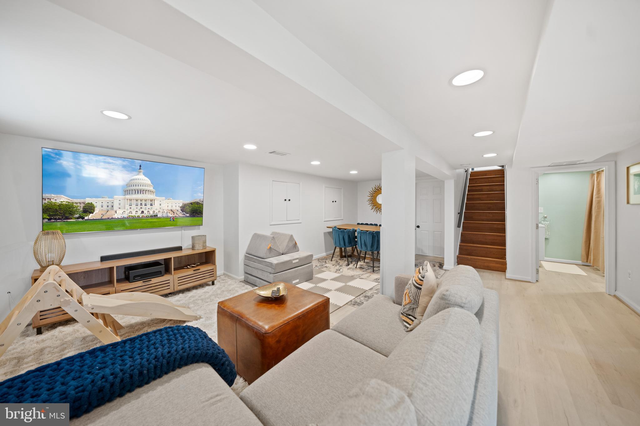 2837 Cameron Road Falls Church, VA 22042 - Photo 28 of 42 a living room with furniture and a flat screen tv