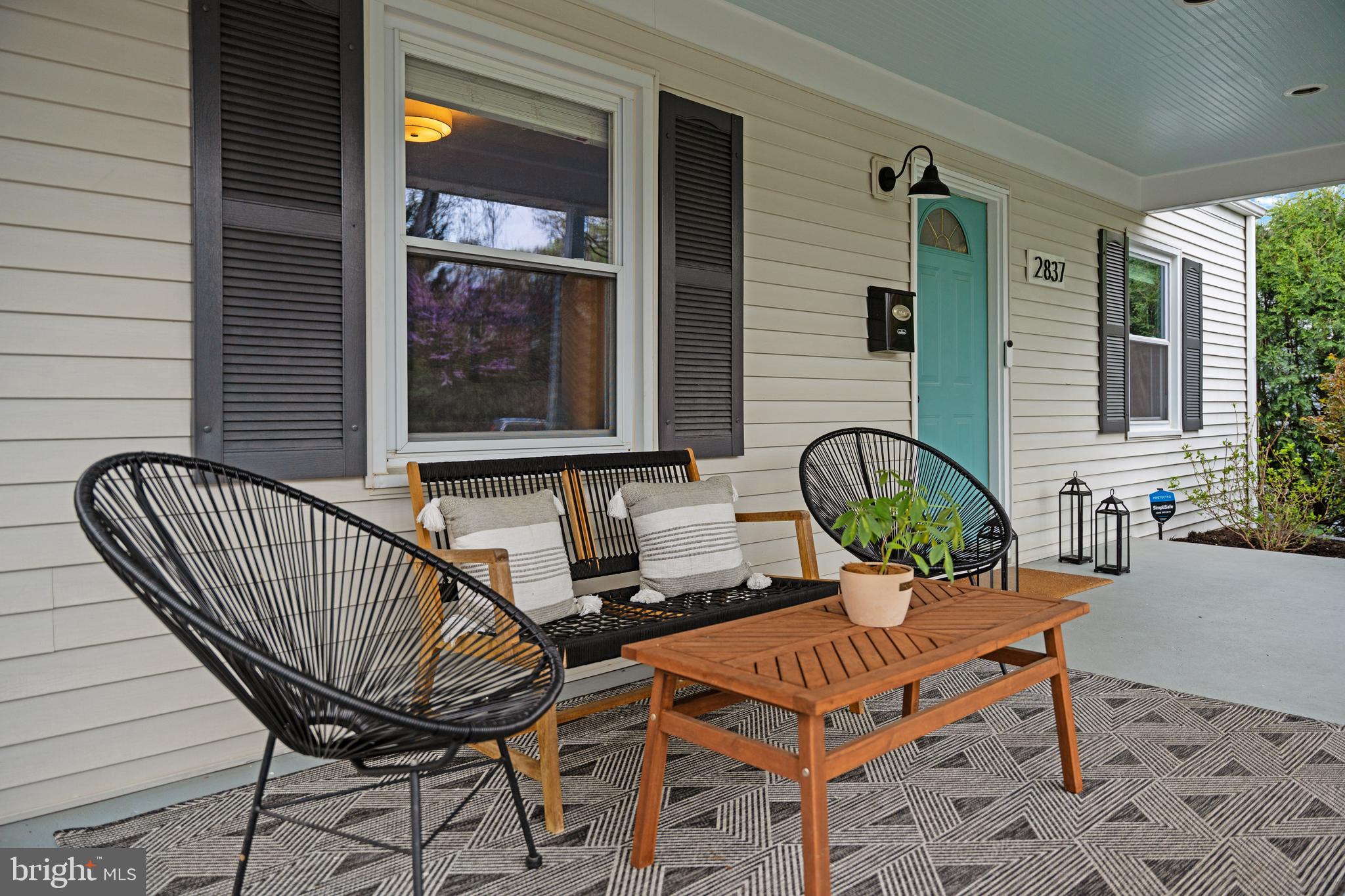 2837 Cameron Road Falls Church, VA 22042 - Photo 5 of 42 a view of a chair and table in the balcony
