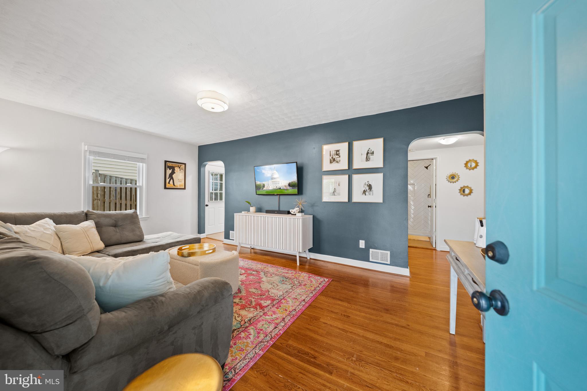 2837 Cameron Road Falls Church, VA 22042 - Photo 6 of 42 a living room with furniture and wooden floor