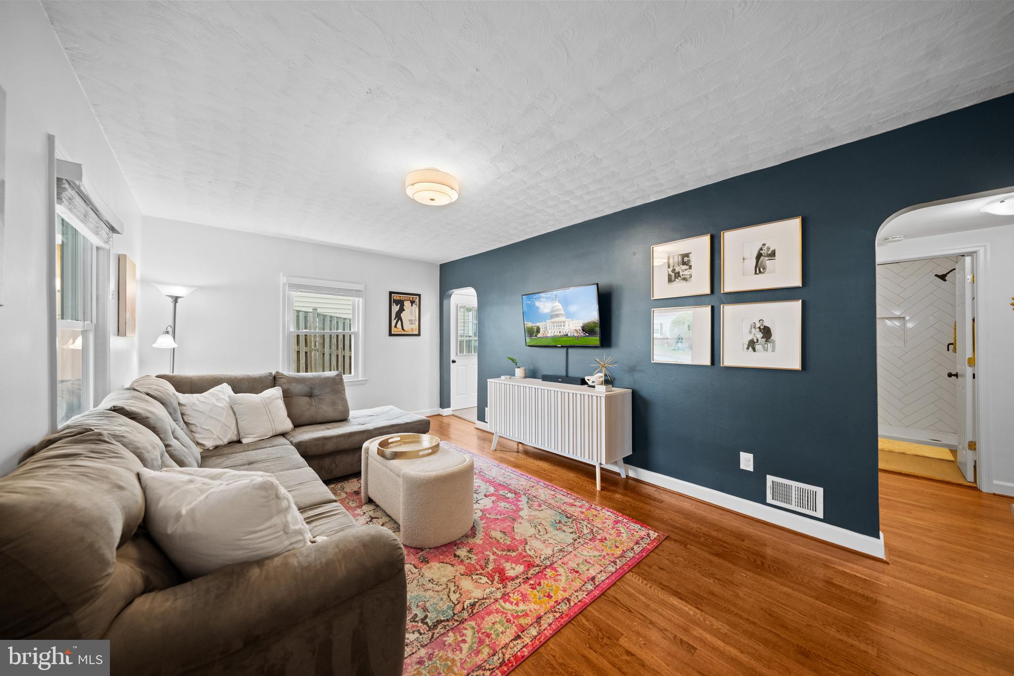 2837 Cameron Road Falls Church, VA 22042 - Photo 7 of 42 a living room with furniture and wooden floor