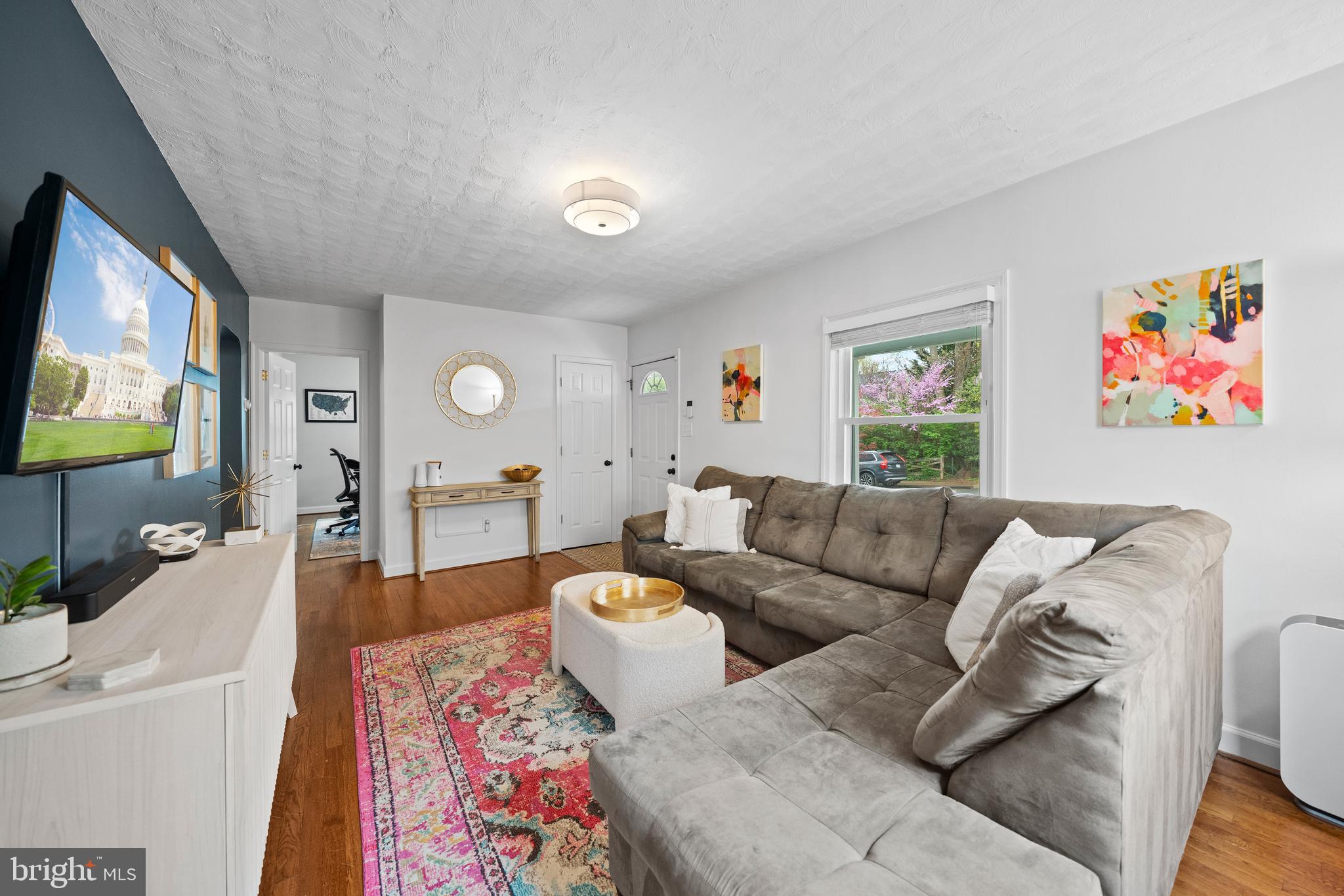 2837 Cameron Road Falls Church, VA 22042 - Photo 9 of 42 a living room with furniture and a flat screen tv